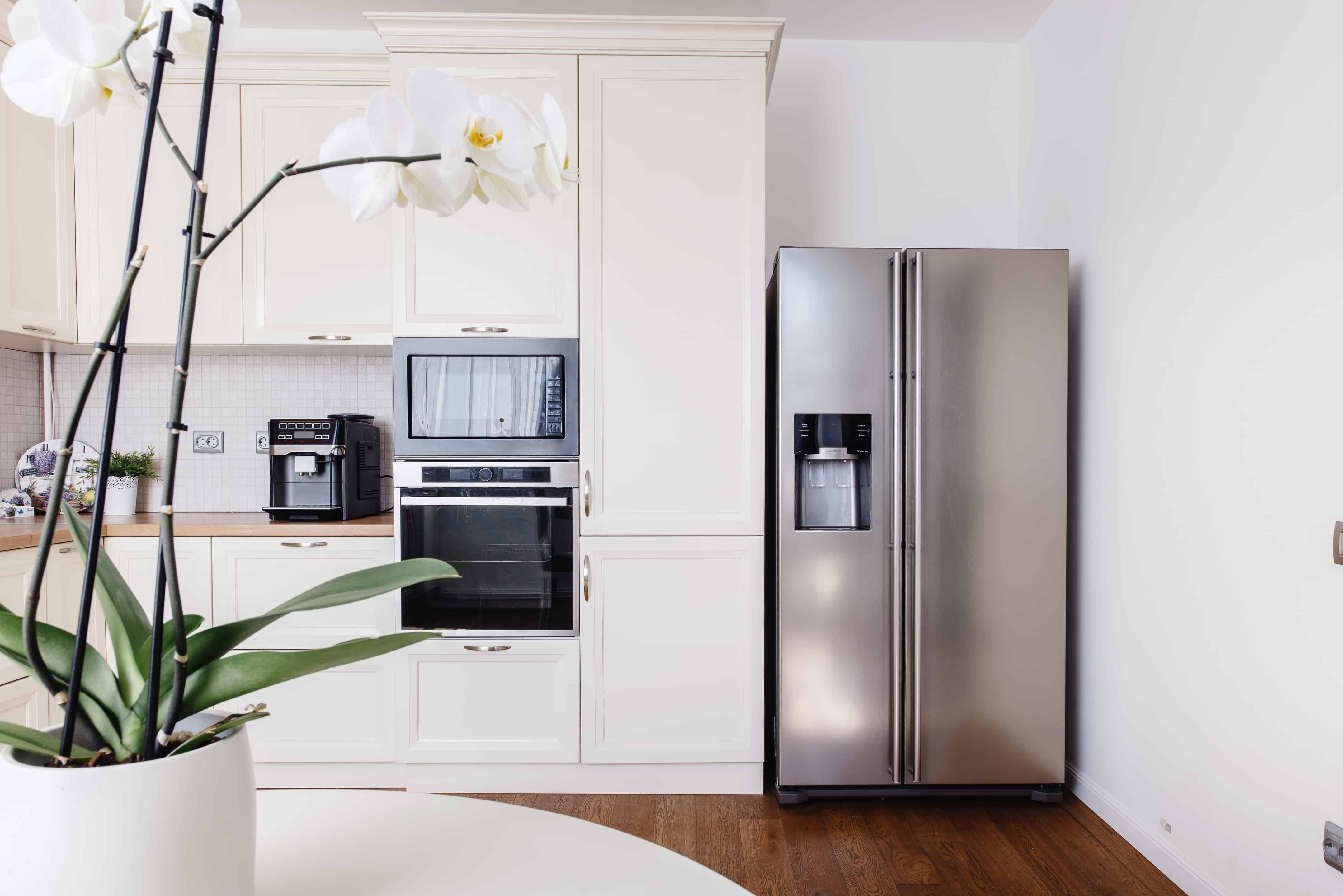 Modern appliances and new design in kitchen. Loft kitchen and apartment - Mayflower®