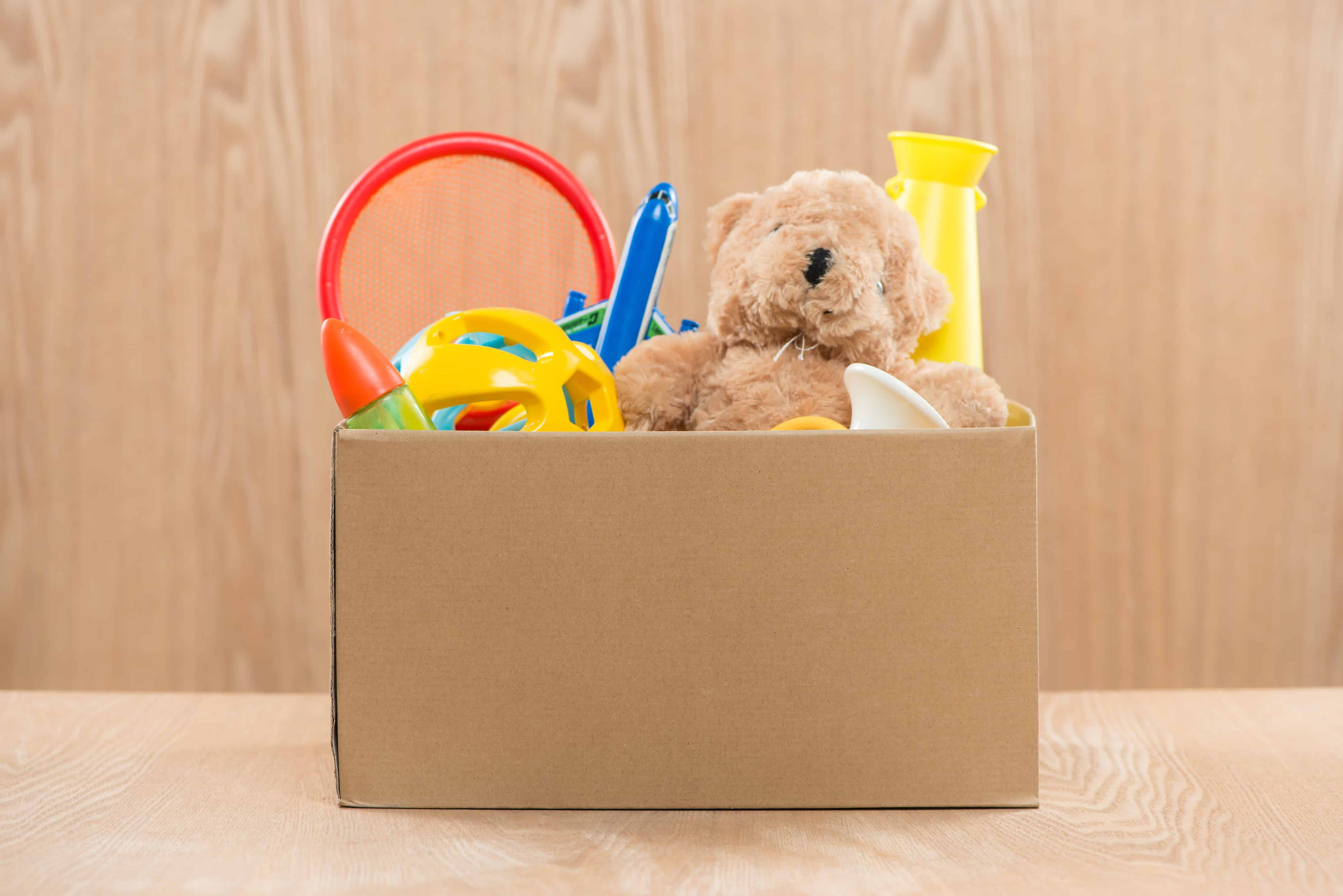 How To Cash In Unwanted Stuff - box filled with unwanted toys and other items - Mayflower